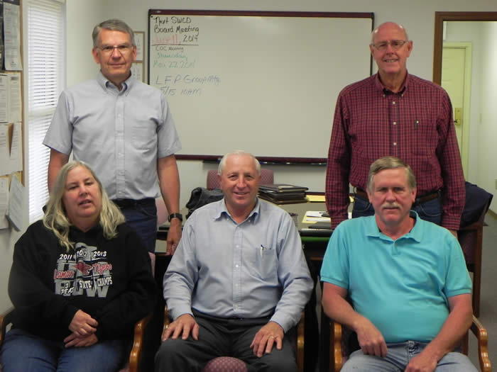 Left Side: (front row) Bonnie Wilcox, Gary Don Letterman, Dr. Jerry Fry, (back row) Bob Schultheis, Ken Parsons. Webster County Board Members
