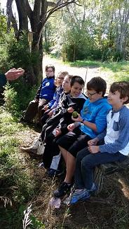 Kids in Outdoor Classroom in Atchison County, Mo listening to MDC Agent