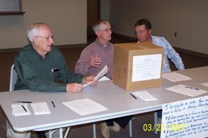 Judges collecting election ballots.