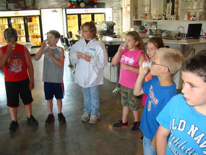 Kids at Shatto Dairy trying products