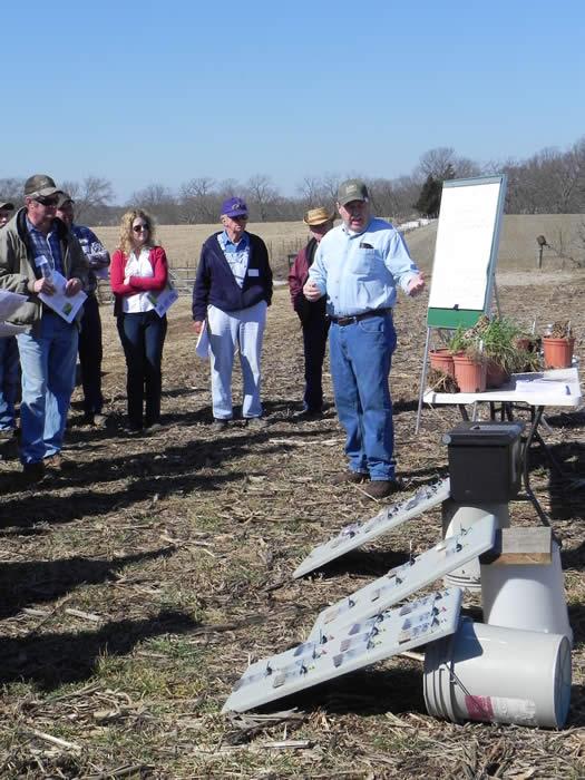 Jerry Kaiser, NRCS plant materials specialist, explained the benefits of cover crops and the cover crop strip trials planted on the Lohmann farm.